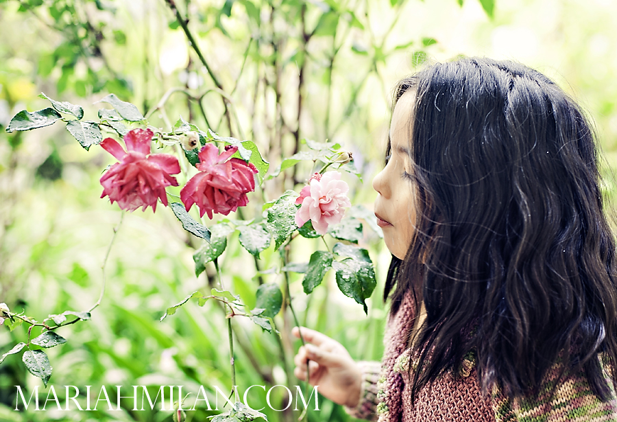 Ryenne smelling maui roses